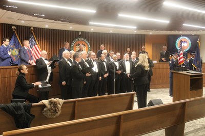 First Falls Supervisors Meeting in New Building Opens with Song, Color Guard